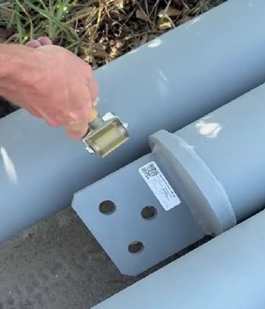 QR-coded structural part being scanned in the field